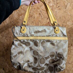 Yellow/gold Coach tote